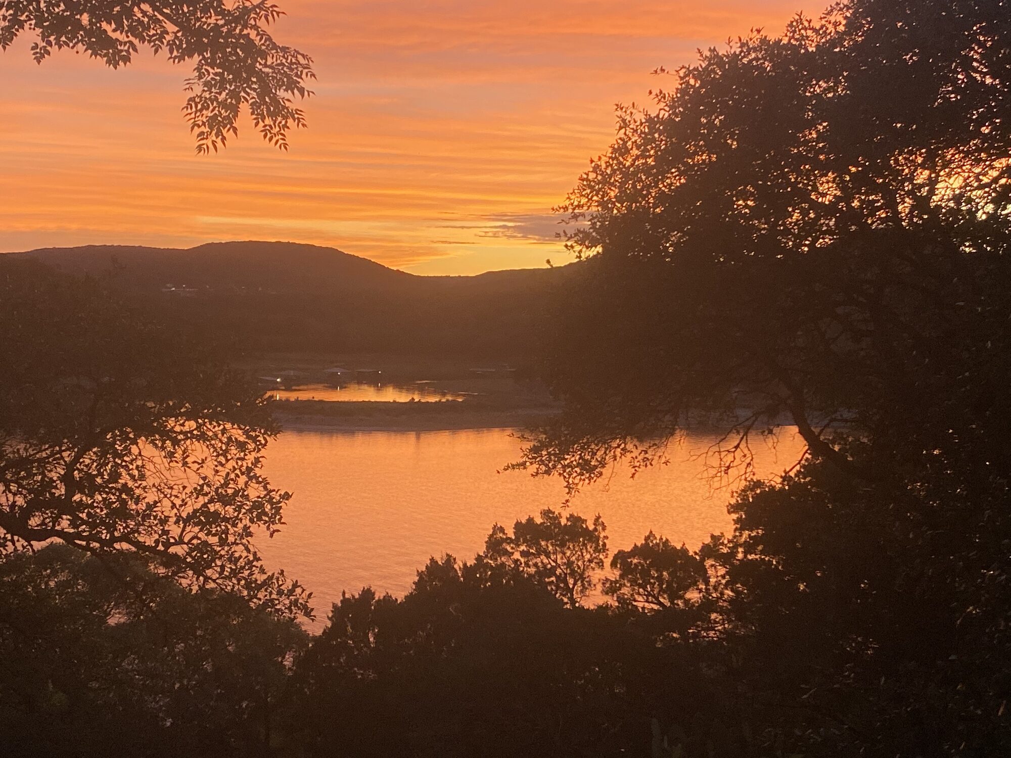 Texas Sunset Ranch at golden hour over Lake Travis